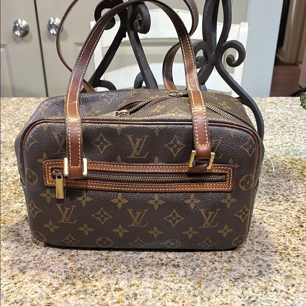 Louis Vuitton Cite Monogram Handbag